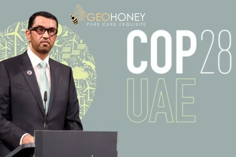 Dr. Sultan bin Ahmed Al Jaber speaking at the 14th Petersberg Climate Dialogue in Berlin, with the COP28 UAE logo and an image of the Earth.